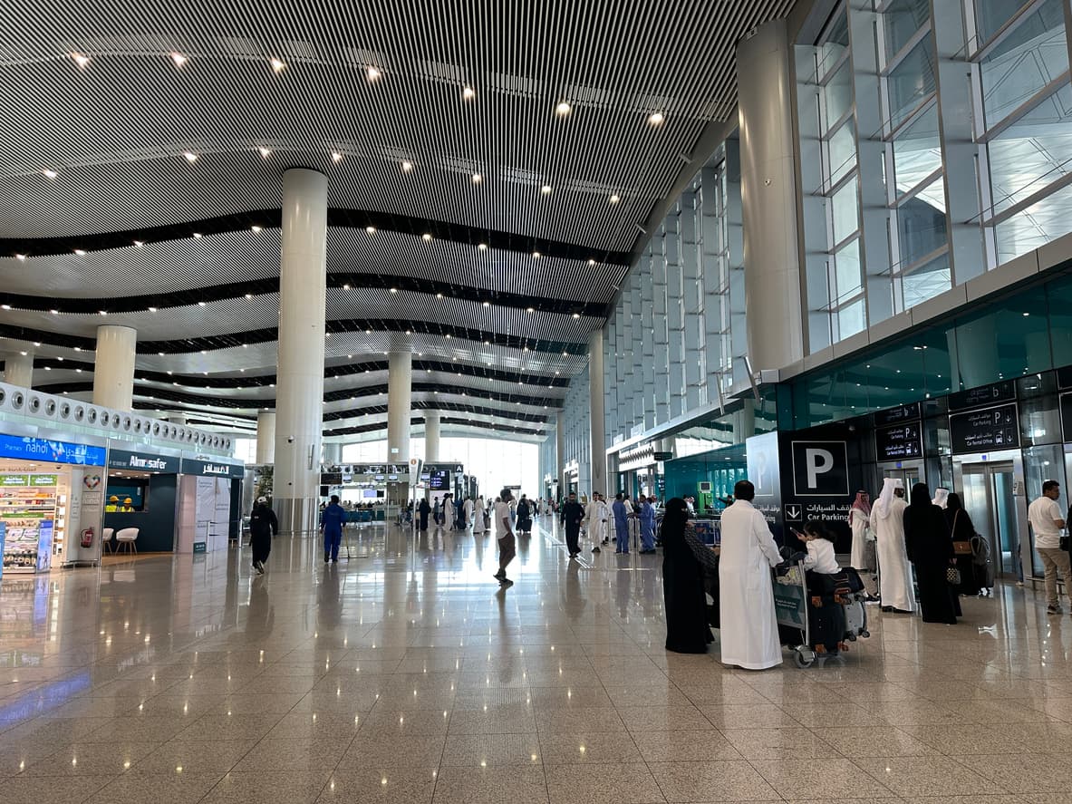 Travelers inside a terminal at King Khalid International Airport in Riyadh, Saudi Arabia, site of the Riyadh airport attack
