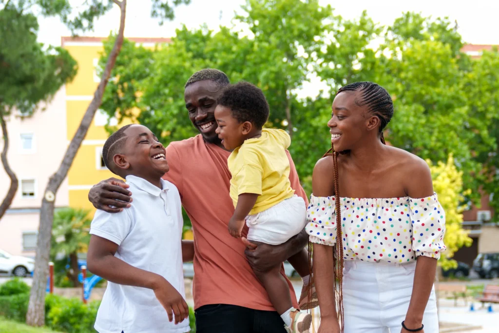 joyful african family embracing in city park fath 2025 03 05 07 53 57 utc