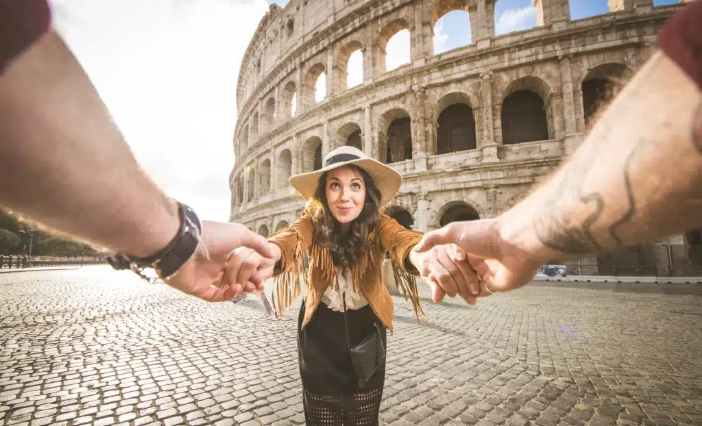 What Italy’s New Citizenship Restrictions Changes for Relocating Americans Amid U.S. Social Crisis Mean 5 couple-at-colosseum-rome