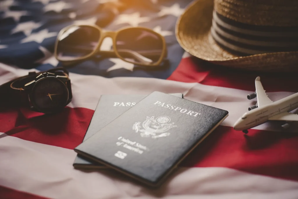 A Practical Guide for Americans Planning to Move Abroad 3 passport is placed on the us flag preparing for a 2025 02 12 23 07 30 utc