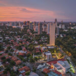 Aerial sunset view of Asunción, Paraguay, where Paraguay residency applications hit a record 47,687 in 2025 as Americans joined a 63% surge