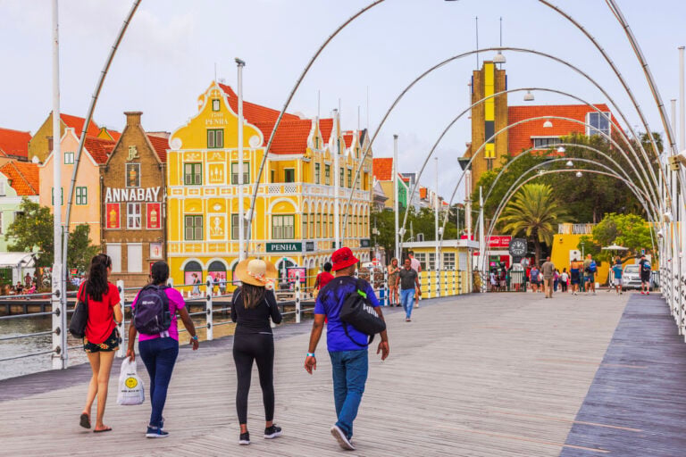 American Emigration Revue 43 The Queen Emma Bridge in Willemstad, Curaçao, where Curaçao pensionado scheme applicants are interested in living long term.