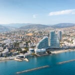 Aerial view of Limassol's coastline and luxury high-rise developments, a common location for Cyprus permanent residence property investments.