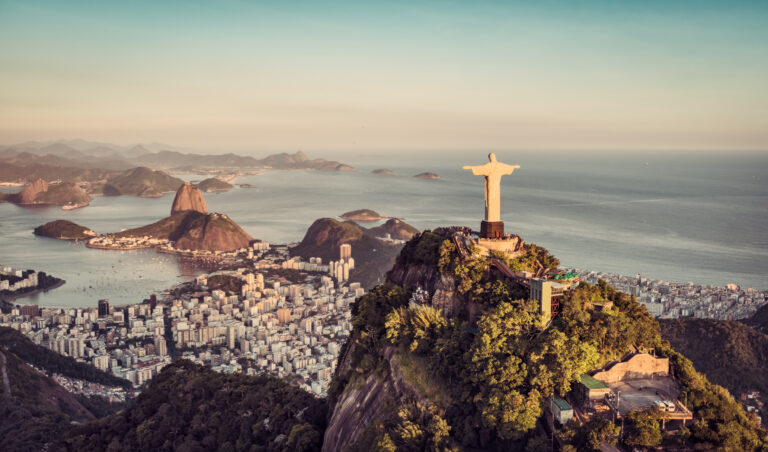 American Emigration Revue 10 Aerial panorama of Botafogo Bay and Sugar Loaf Mountain, Rio De Janeiro, Brazil. A major draw for Americans moving to Brazil.