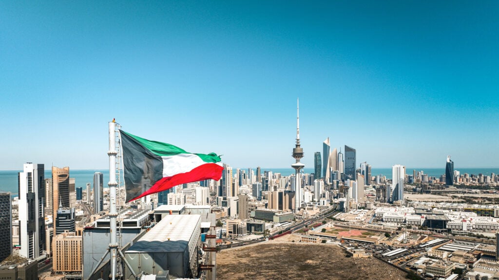 Kuwait's 15-Year Investor Residency Permit Demands a $16.3 Million Floor 2 Kuwait City skyline with the national flag and Liberation Tower, where the Kuwait investor residency permit applies