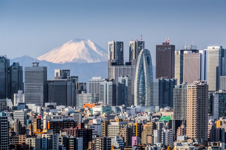 American Emigration Revue 10 Tokyo skyline with Mount Fuji in the background, where 70,000 Americans face updated foreign property restrictions