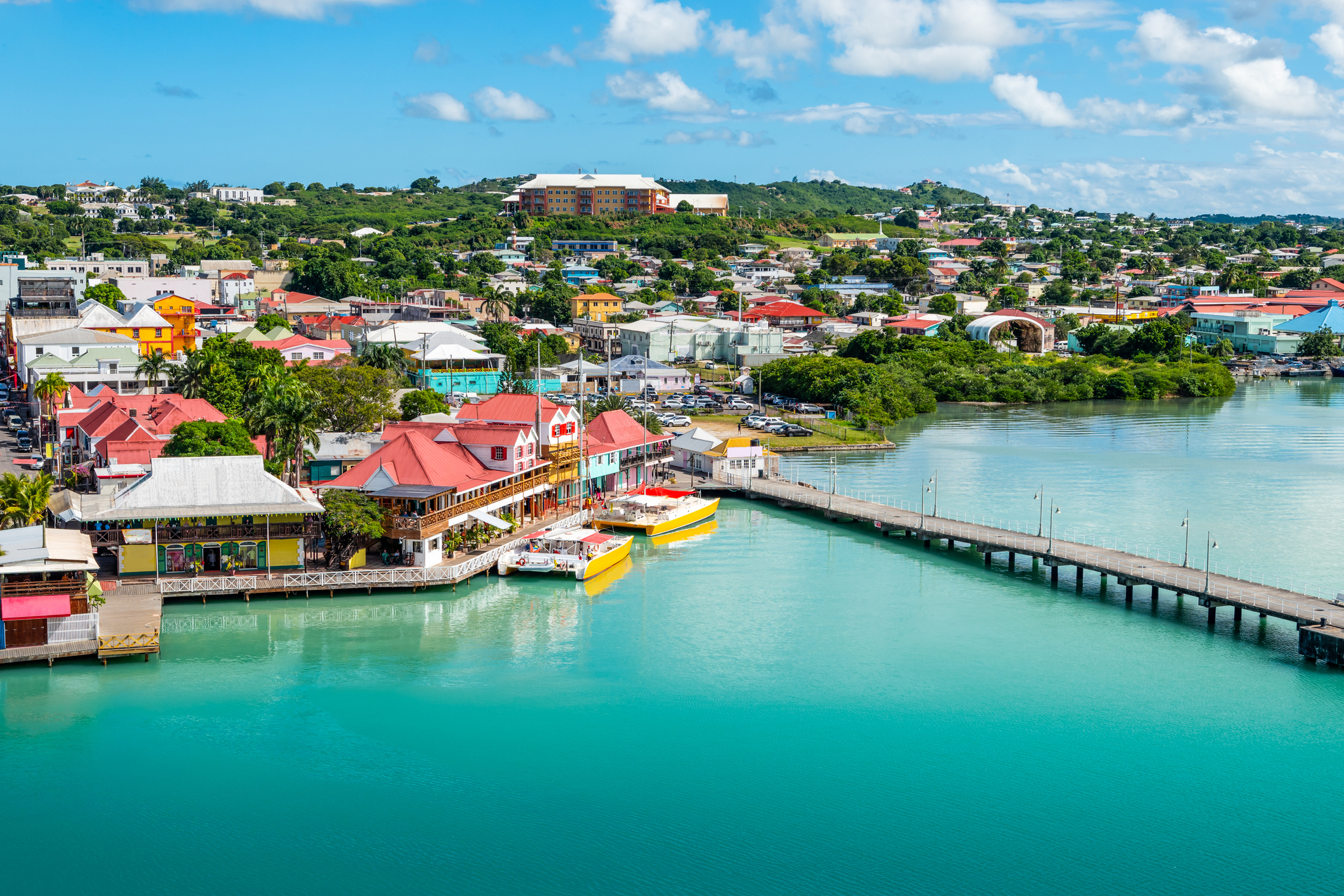 American Emigration Revue 9 St. John's harbor in Antigua and Barbuda, where Americans rank second in citizenship by investment applications