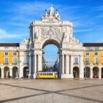 Rua Augusta Arch at Praca do Comercio in Lisbon, where Americans face Portugal residence permit delays at AIMA